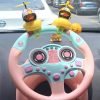 Interactive toy steering wheel for kids with fun sounds and lights, perfect for pretend play and developing motor skills.